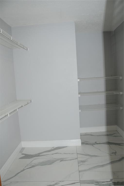 2106 Whitlock Place Dover, FL 33527 - Photo 30 of 83 a view of room with walk in closet