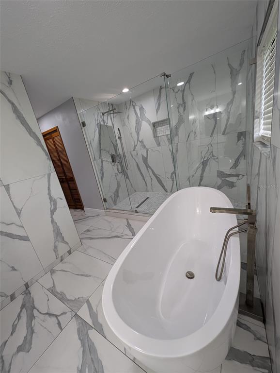 2106 Whitlock Place Dover, FL 33527 - Photo 33 of 83 a bathroom with a sink and mirror