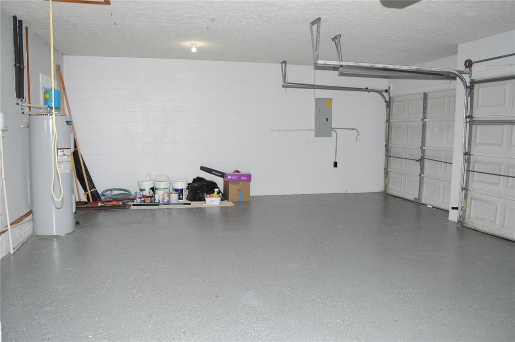 2106 Whitlock Place Dover, FL 33527 - Photo 64 of 83 a view of a room with racks on the wall