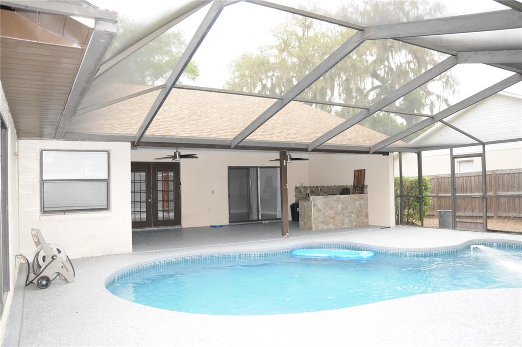 2106 Whitlock Place Dover, FL 33527 - Photo 65 of 83 a view of a room with a sink and cabinets