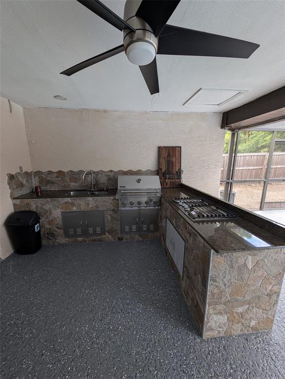 2106 Whitlock Place Dover, FL 33527 - Photo 71 of 83 a kitchen with stainless steel appliances granite countertop a stove a sink and a microwave