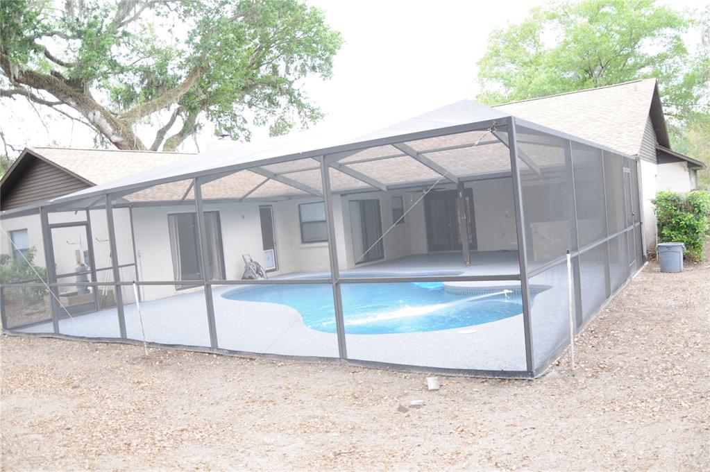 2106 Whitlock Place Dover, FL 33527 - Photo 72 of 83 a view of a house with a yard