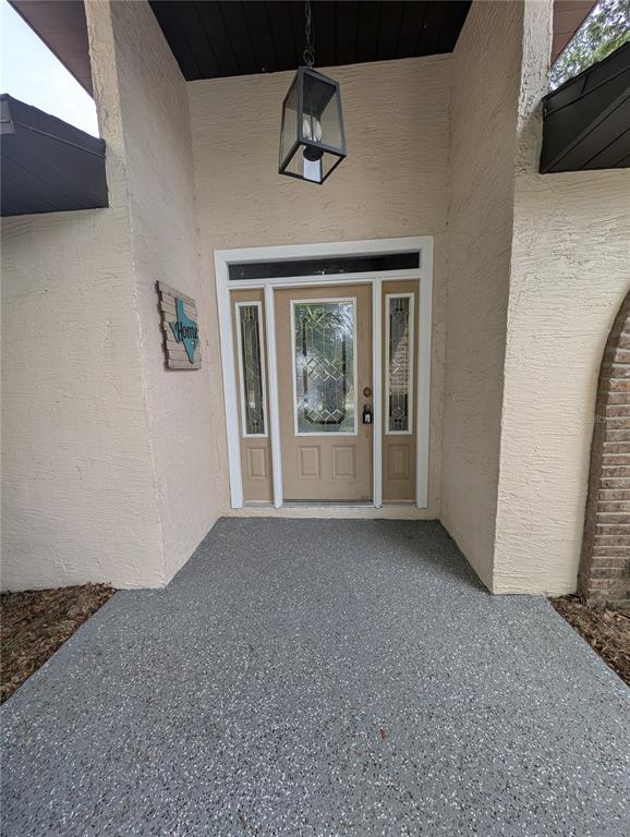 2106 Whitlock Place Dover, FL 33527 - Photo 8 of 83 a view of an empty room with a window