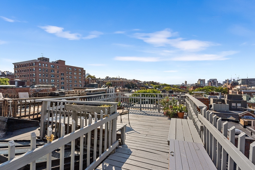 33 Hancock Street, Unit 4 Boston, MA 02114 - Photo 27 of 29 a view of a balcony with city view