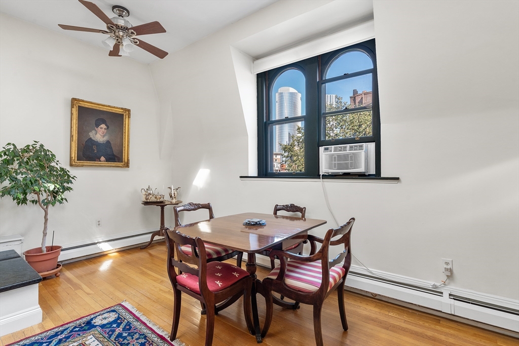 33 Hancock Street, Unit 4 Boston, MA 02114 - Photo 9 of 29 a dining room with furniture and window