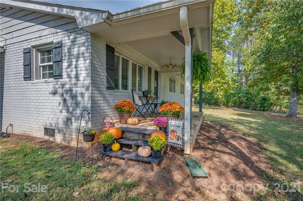 455 Sandy Plains Road Tryon, NC 28782 - Photo 2 of 28 a view of a two chair in the patio