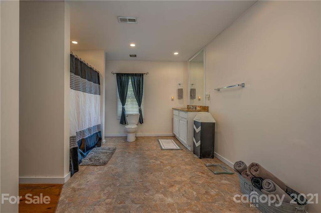 455 Sandy Plains Road Tryon, NC 28782 - Photo 16 of 28 a view of a storage & utility room with a sink