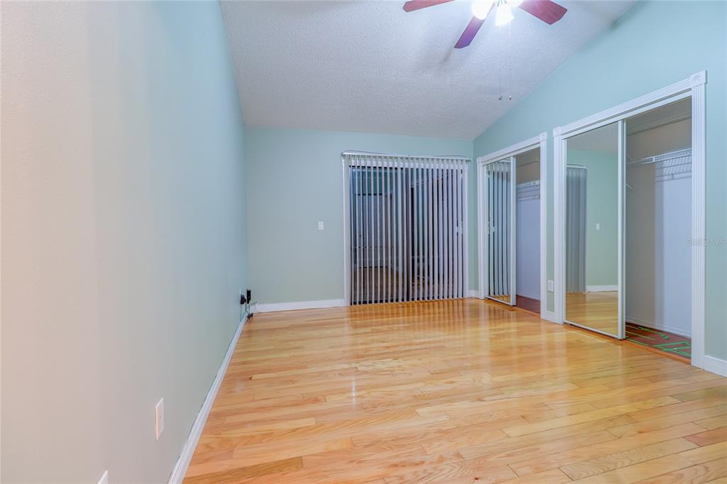 5100 Burchette Road, Unit 1607 Tampa, FL 33647 - Photo 27 of 39 a view of an empty room with a ceiling fan