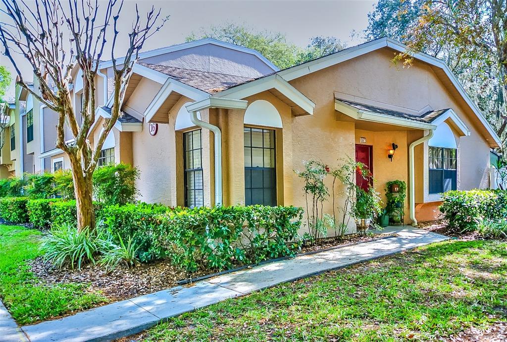 5100 Burchette Road, Unit 1607 Tampa, FL 33647 - Photo 4 of 39 a front view of house with a garden