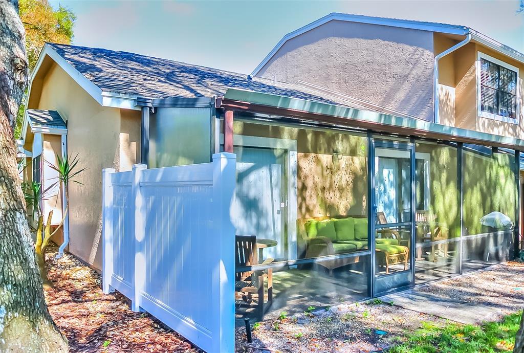 5100 Burchette Road, Unit 1607 Tampa, FL 33647 - Photo 6 of 39 a front view of a house with a porch