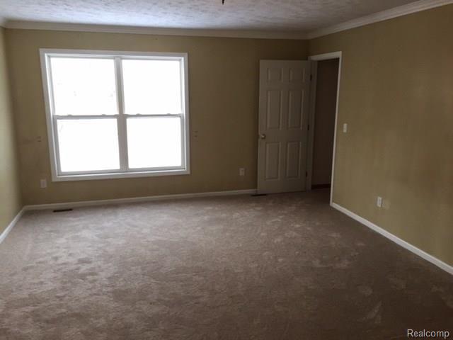 6084 Faussett Road Howell, MI 48855 - Photo 6 of 13 bedroom 2.jpg