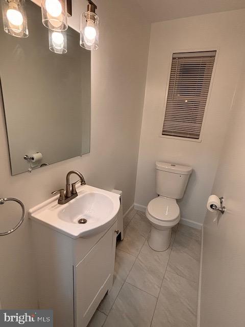 7912 Riggs Road Hyattsville, MD 20783 - Photo 10 of 40 Half bath on 1st Fl w/ new sink, vanity and toilet