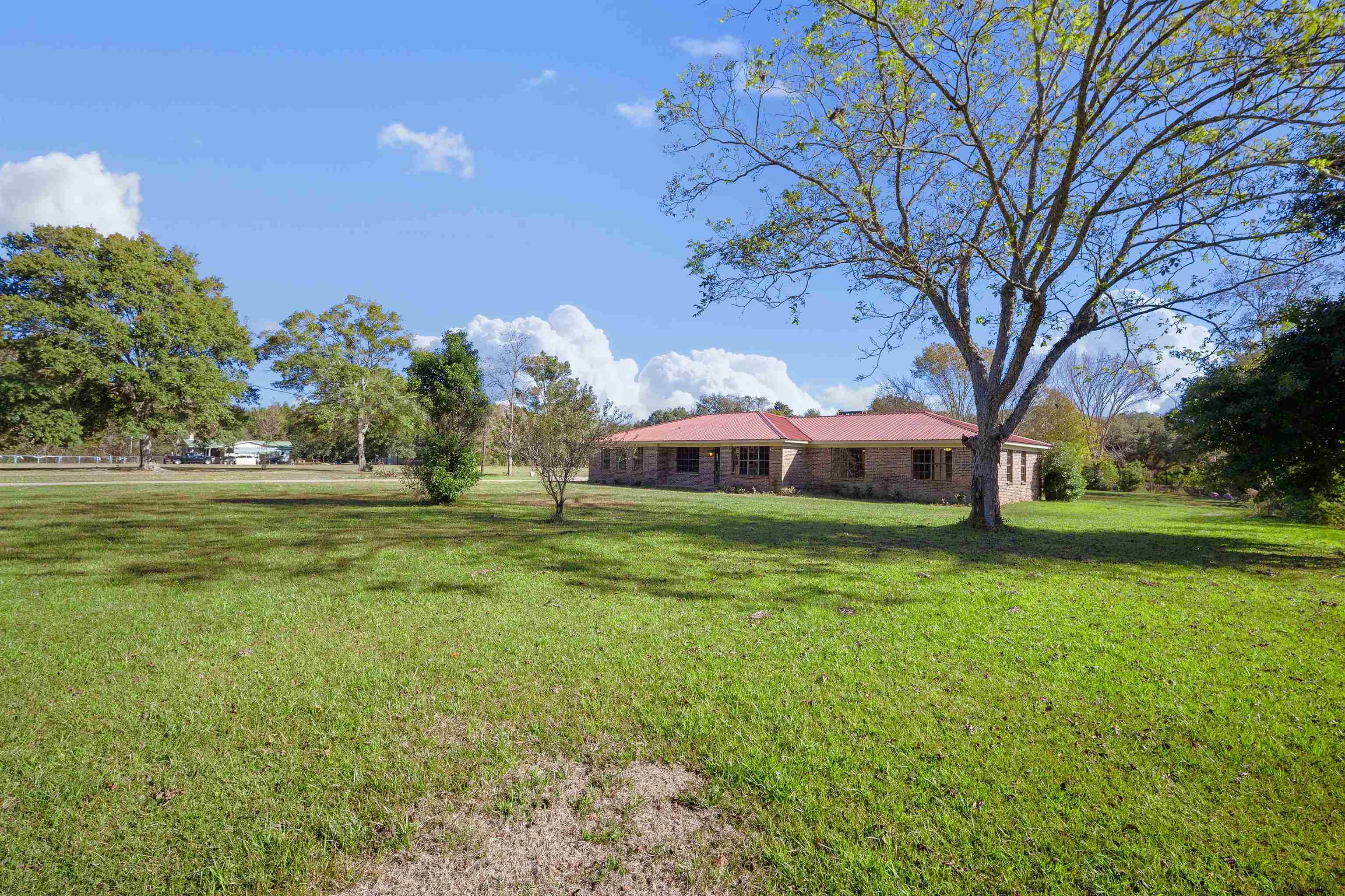 10285 Argyle Road Irvington, AL 36544 - Photo 2 of 28 View of green lawn