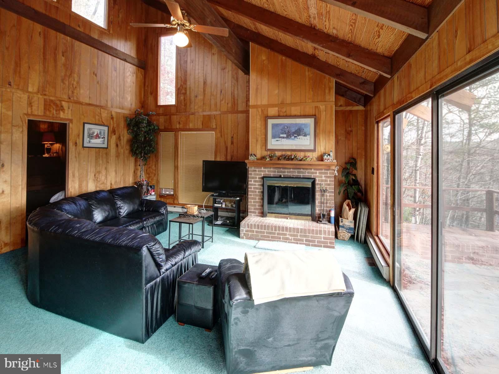416 Killmon Road Basye, VA 22810 - Photo 11 of 31 GREAT ROOM WITH WALL OF WINDOWS FOR NATURAL LIGHT