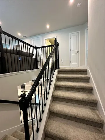 a room with furniture and a flat screen tv