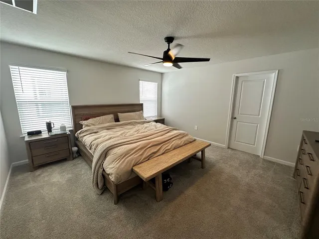 a view of a closet with storage