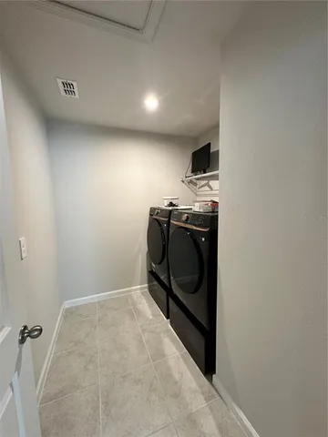 a room with furniture and a large window