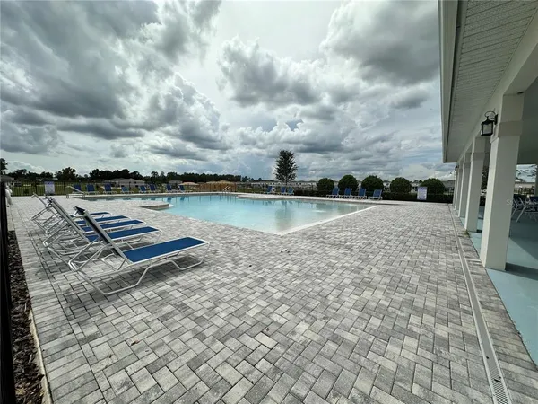 a view of a terrace with chairs