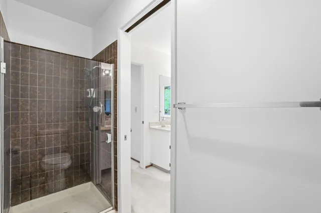 a view of a balcony with chairs