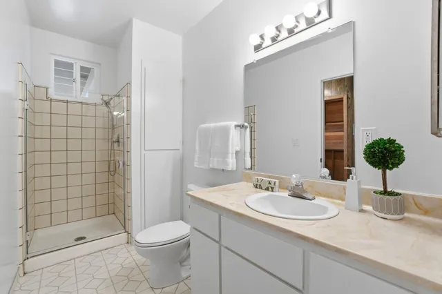 a view of a house with a patio and a couches