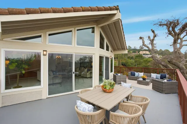 a view of a field with an ocean