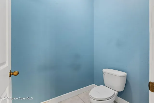 a room with a sink and a mirror