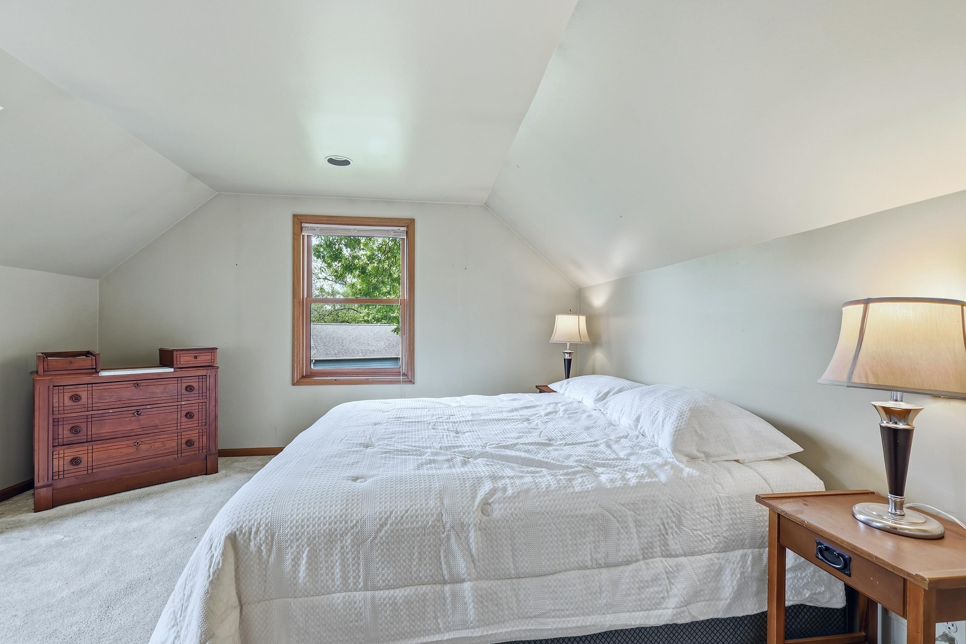 13 Signal Point Lane Galena, IL 61036 - Photo 30 of 47 a bedroom with a bed and a window