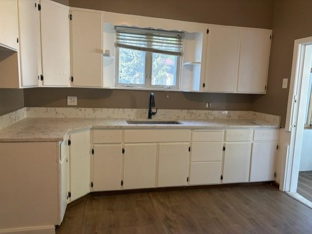 425 West Cleveland Street Spring Valley, IL 61362 - Photo 9 of 14 a kitchen with white cabinets white appliances and a sink