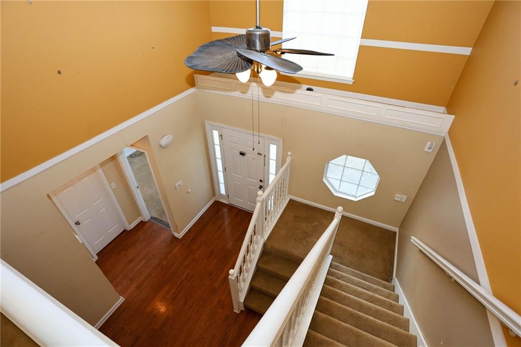 30 Emerson Trail Covington, GA 30016 - Photo 23 of 40 a view of a balcony with wooden floor