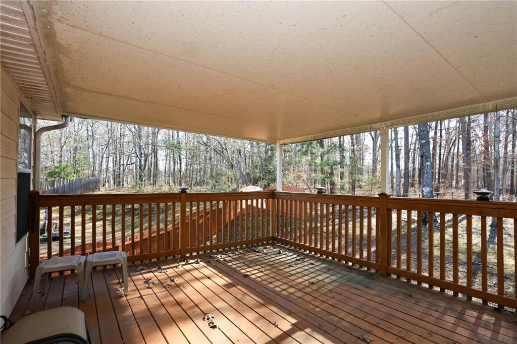30 Emerson Trail Covington, GA 30016 - Photo 31 of 40 a view of a two chairs in the balcony
