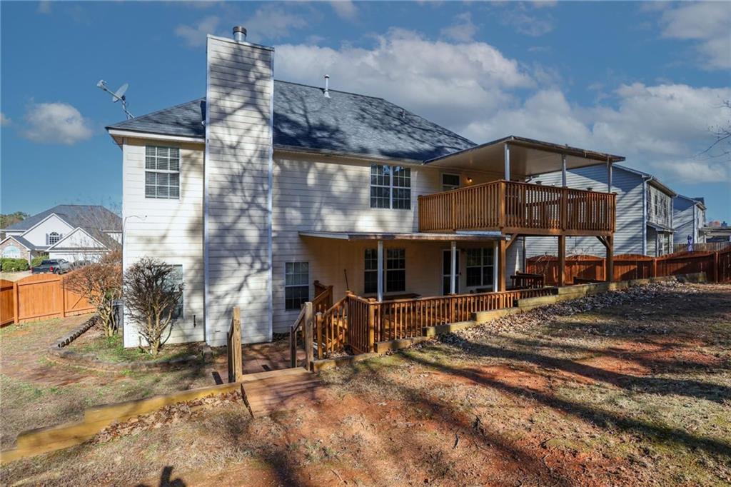 30 Emerson Trail Covington, GA 30016 - Photo 36 of 40 a front view of a house with a yard