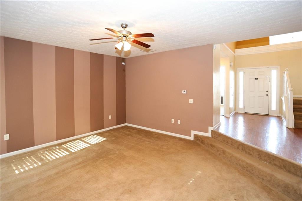 30 Emerson Trail Covington, GA 30016 - Photo 5 of 40 a view of an empty room with a window