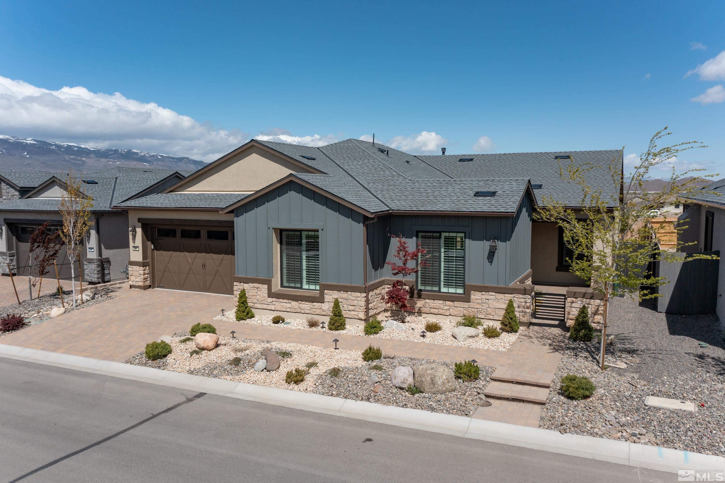 a view of a house with sitting area and furniture