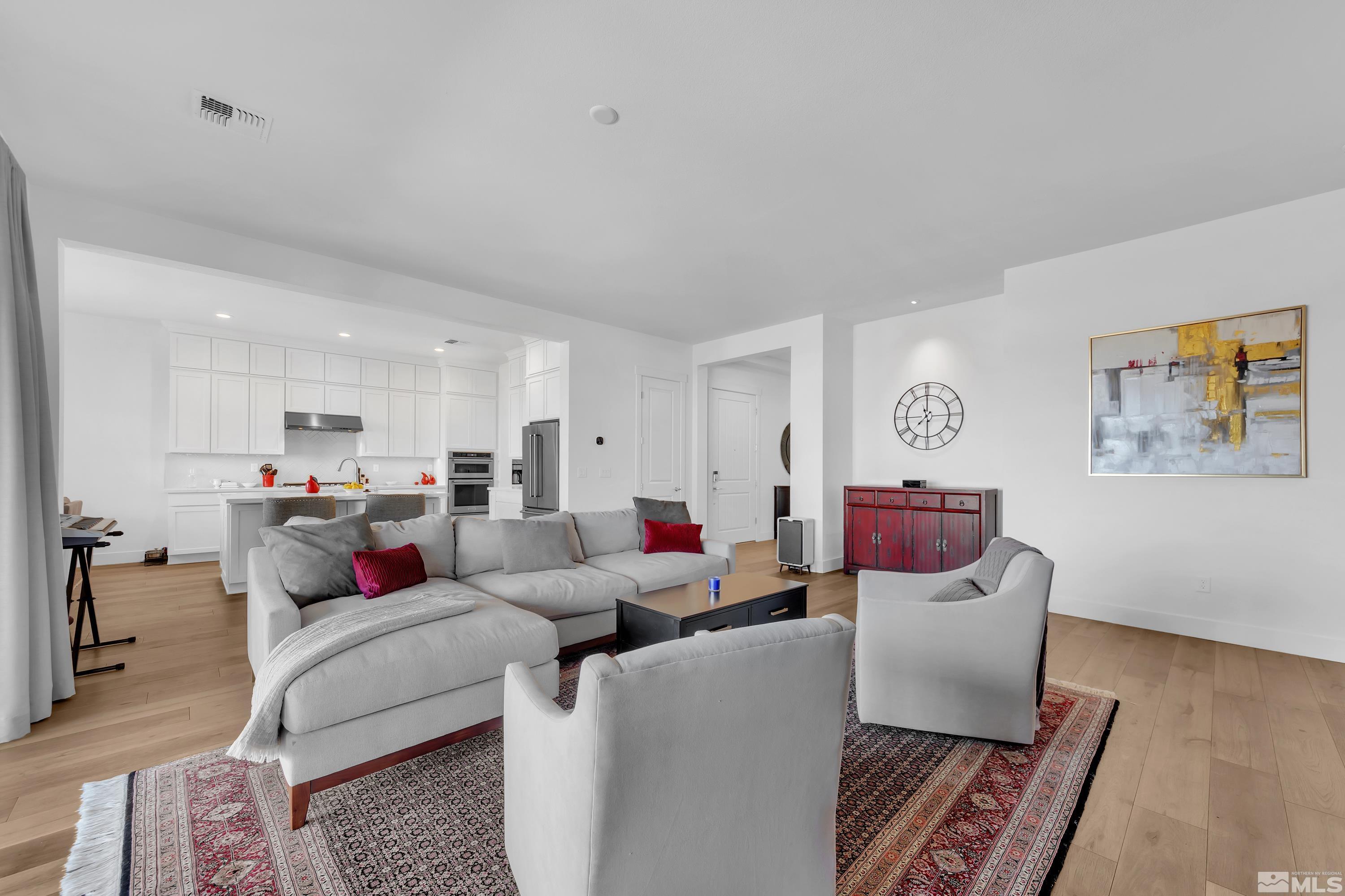 2201 Kate's Bridge Drive Reno, NV 89521 - Photo 17 of 39 a living room with furniture and a view of kitchen