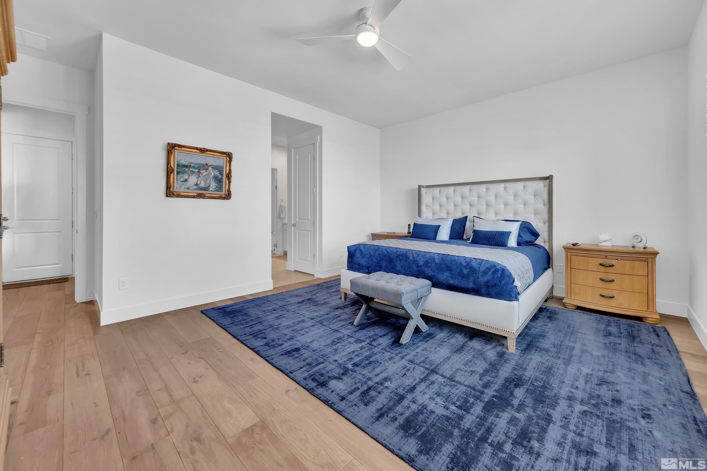 2201 Kate's Bridge Drive Reno, NV 89521 - Photo 20 of 39 a living room with a bed and a couch