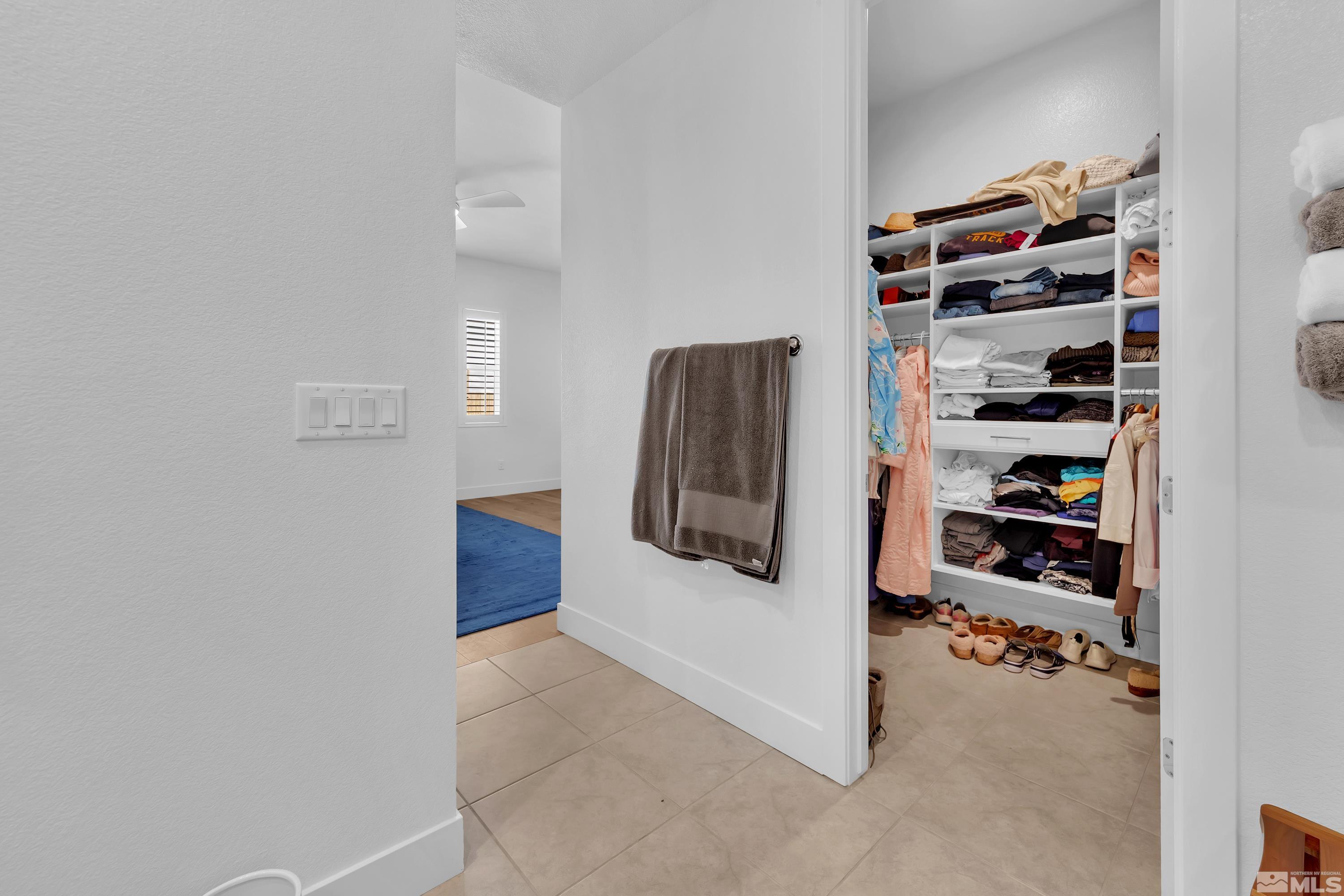 2201 Kate's Bridge Drive Reno, NV 89521 - Photo 22 of 39 a view of walk in closet with clothes and shoes