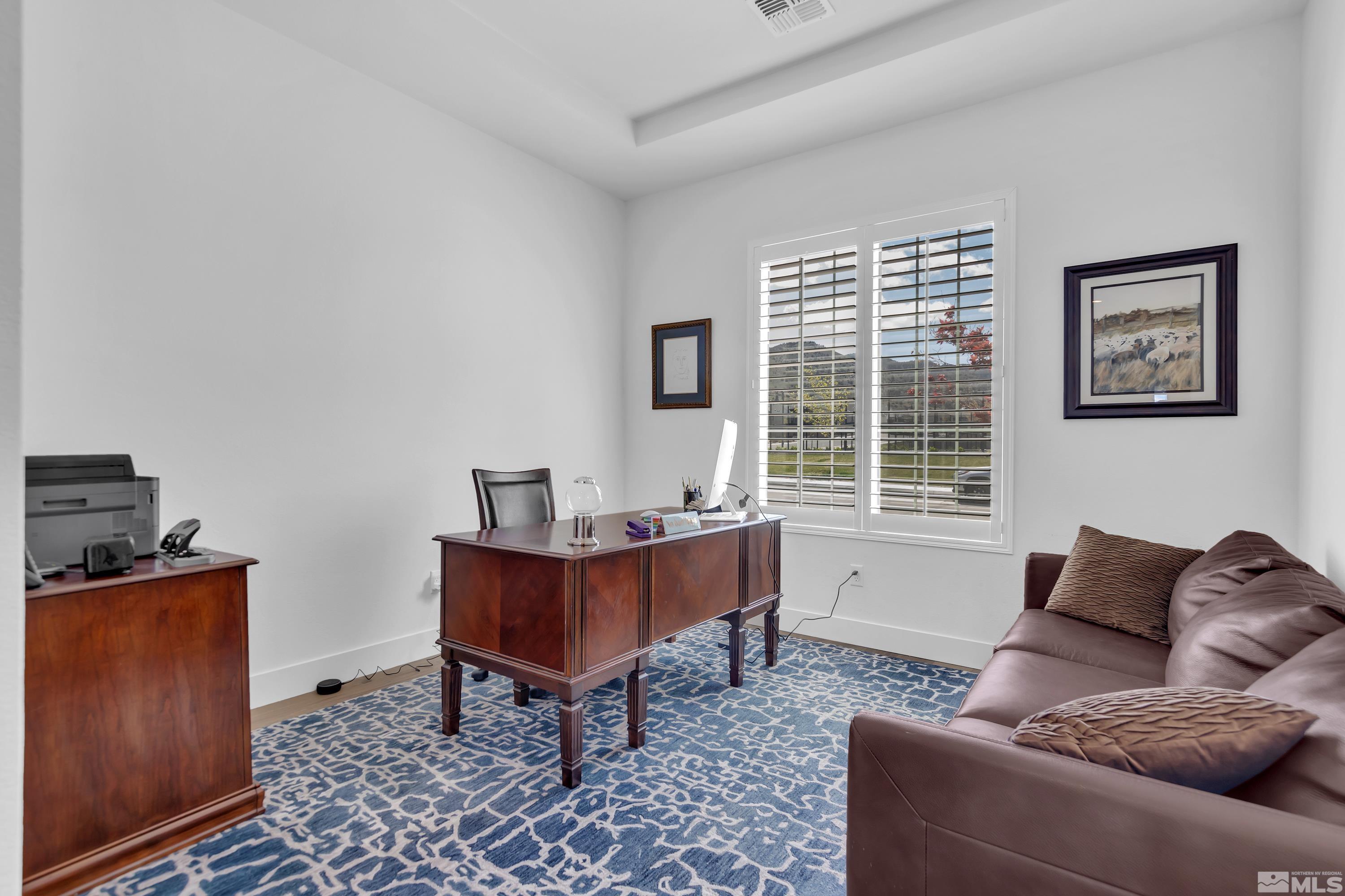 2201 Kate's Bridge Drive Reno, NV 89521 - Photo 24 of 39 a living room with furniture and a window
