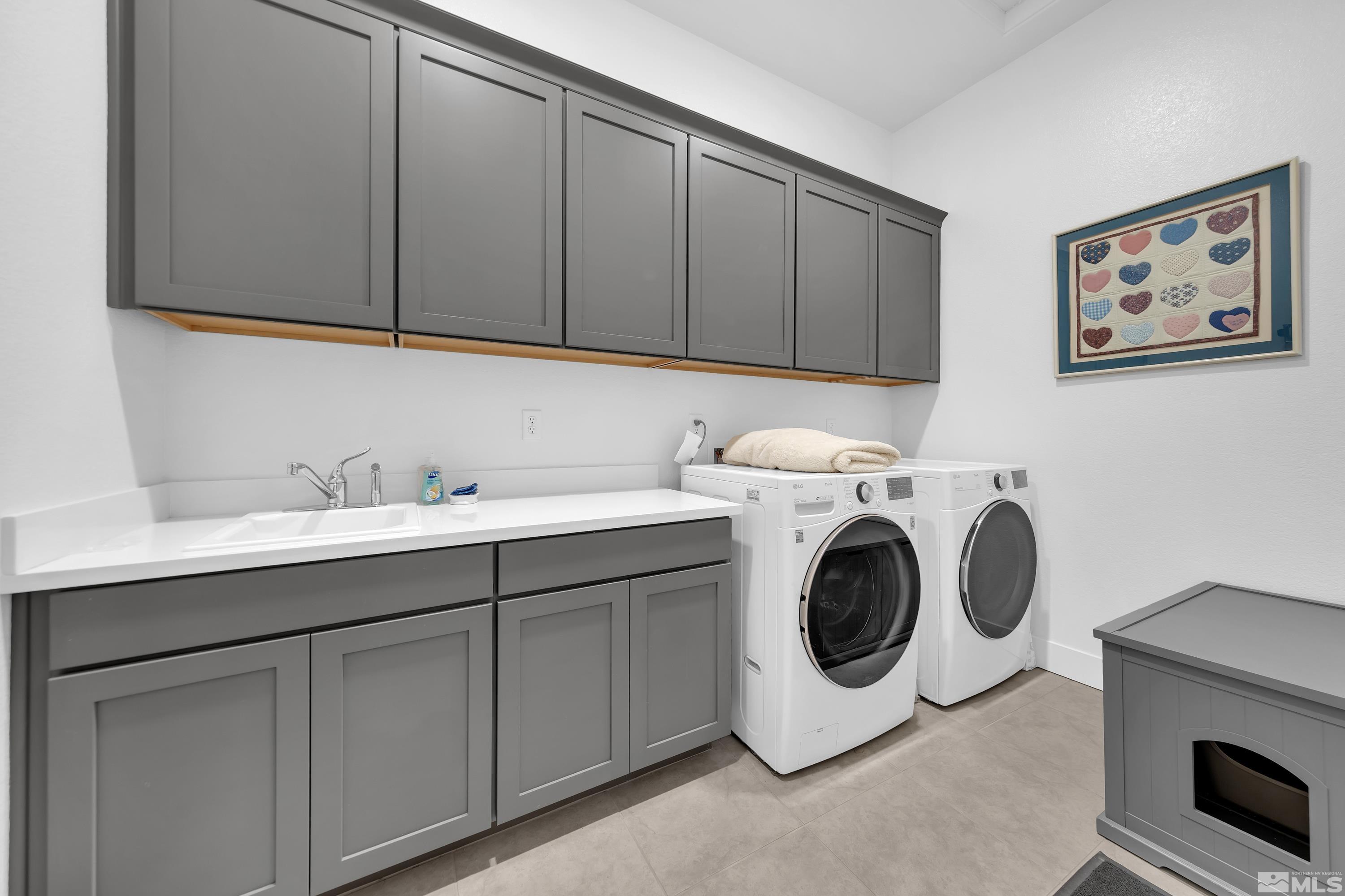 2201 Kate's Bridge Drive Reno, NV 89521 - Photo 25 of 39 a utility room with sink dryer and washer