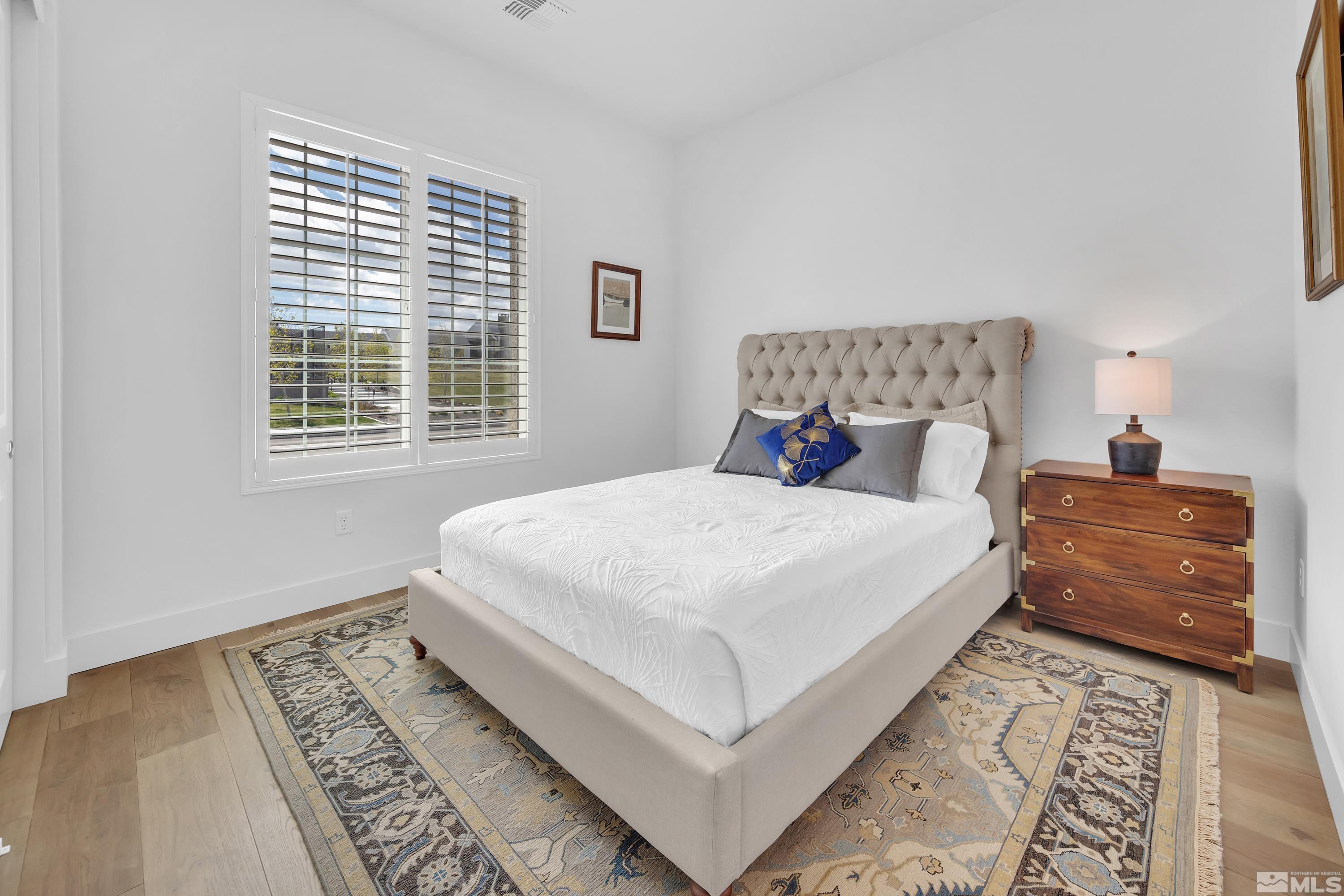 2201 Kate's Bridge Drive Reno, NV 89521 - Photo 26 of 39 a bedroom with a bed and a window