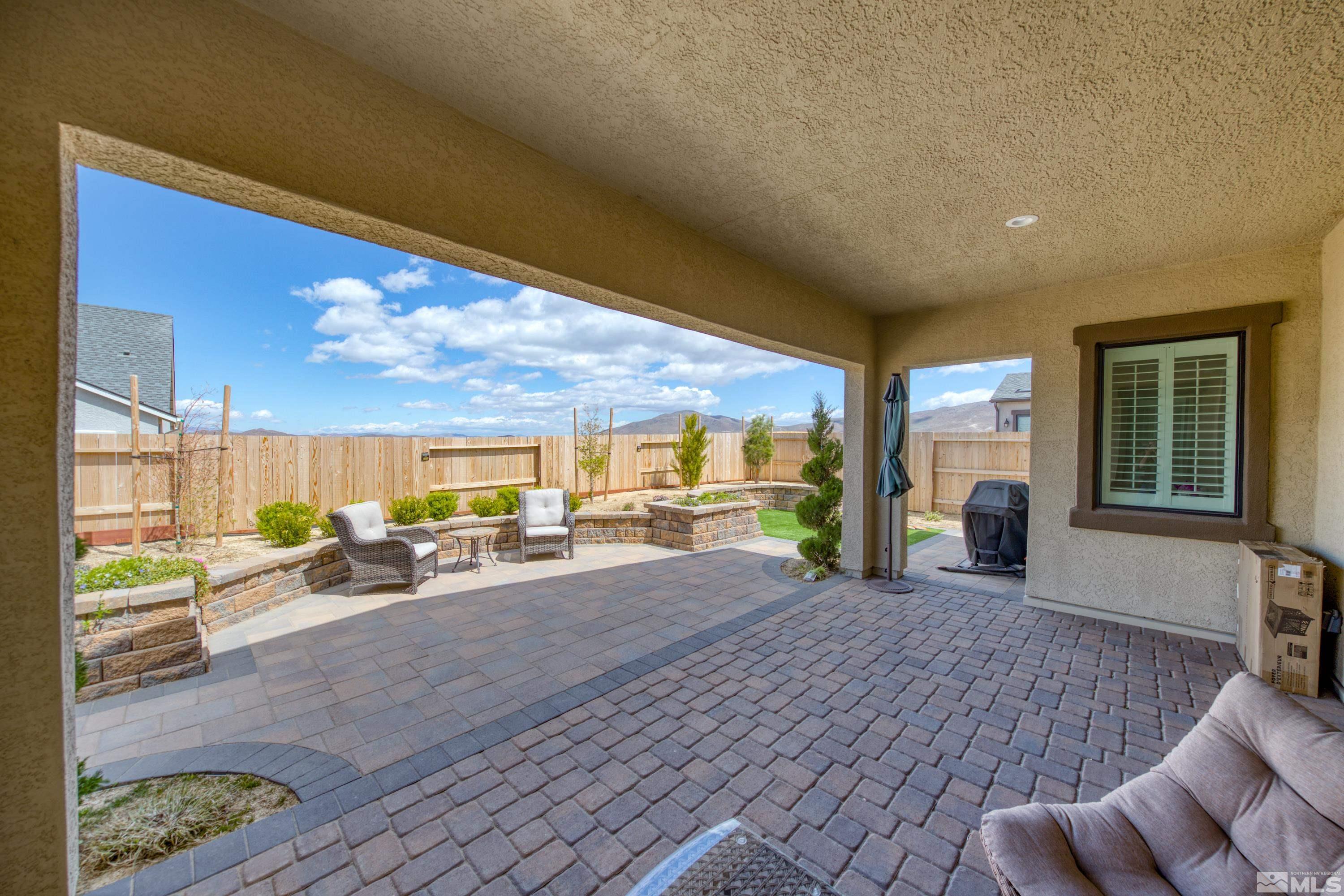 2201 Kate's Bridge Drive Reno, NV 89521 - Photo 29 of 39 a view of a house with a patio