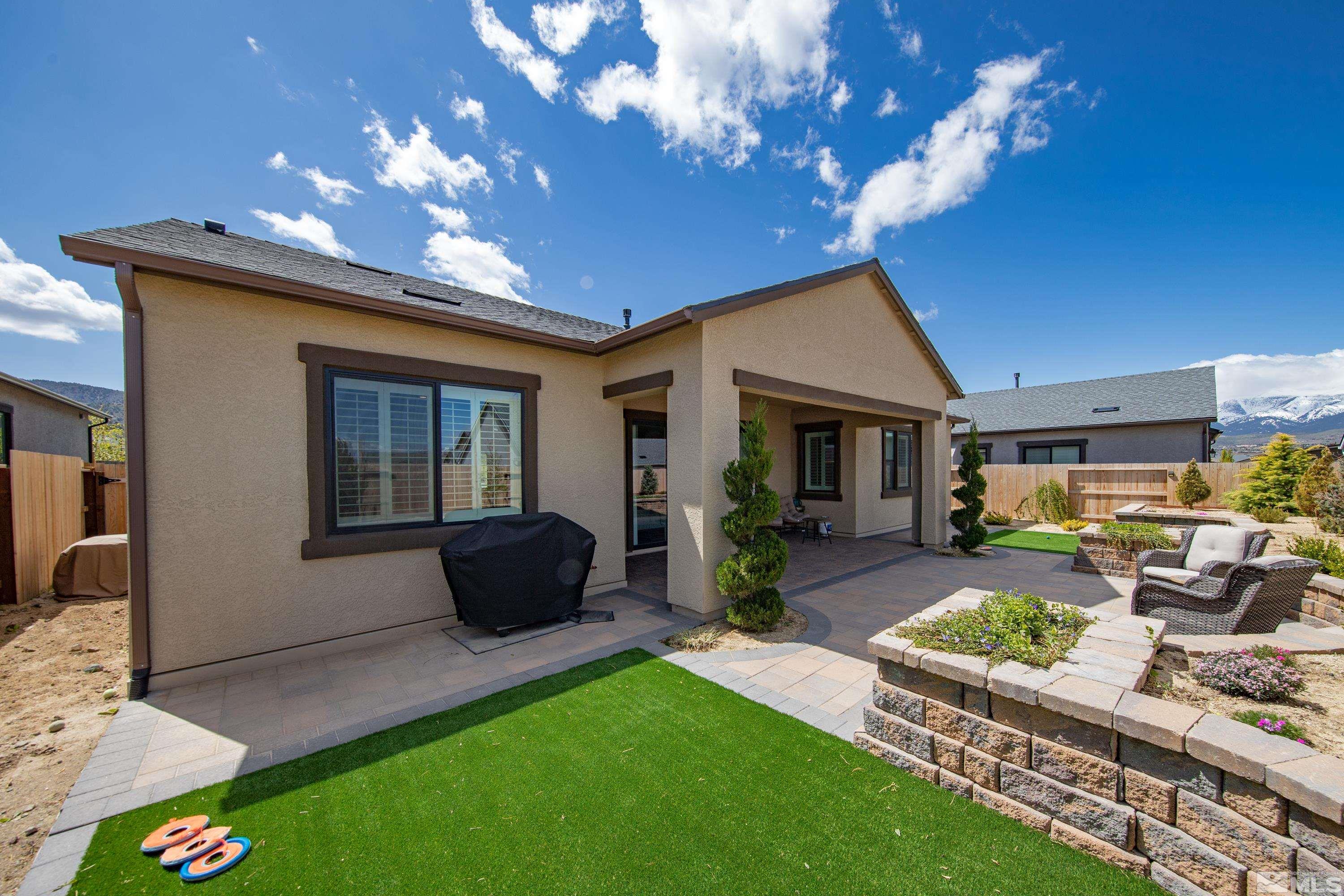 2201 Kate's Bridge Drive Reno, NV 89521 - Photo 30 of 39 a front view of a house with patio