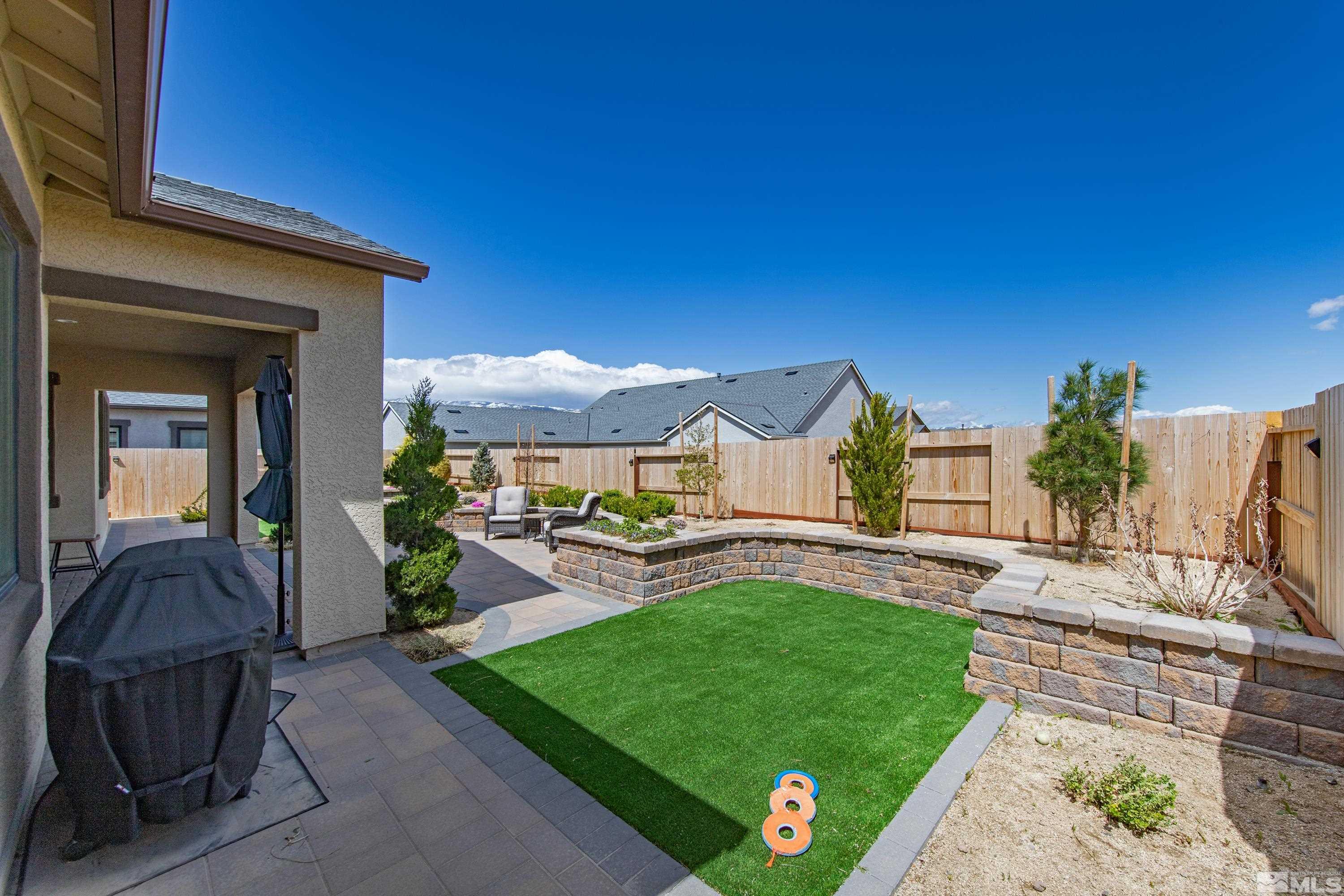 2201 Kate's Bridge Drive Reno, NV 89521 - Photo 31 of 39 a view of backyard with outdoor seating and plants