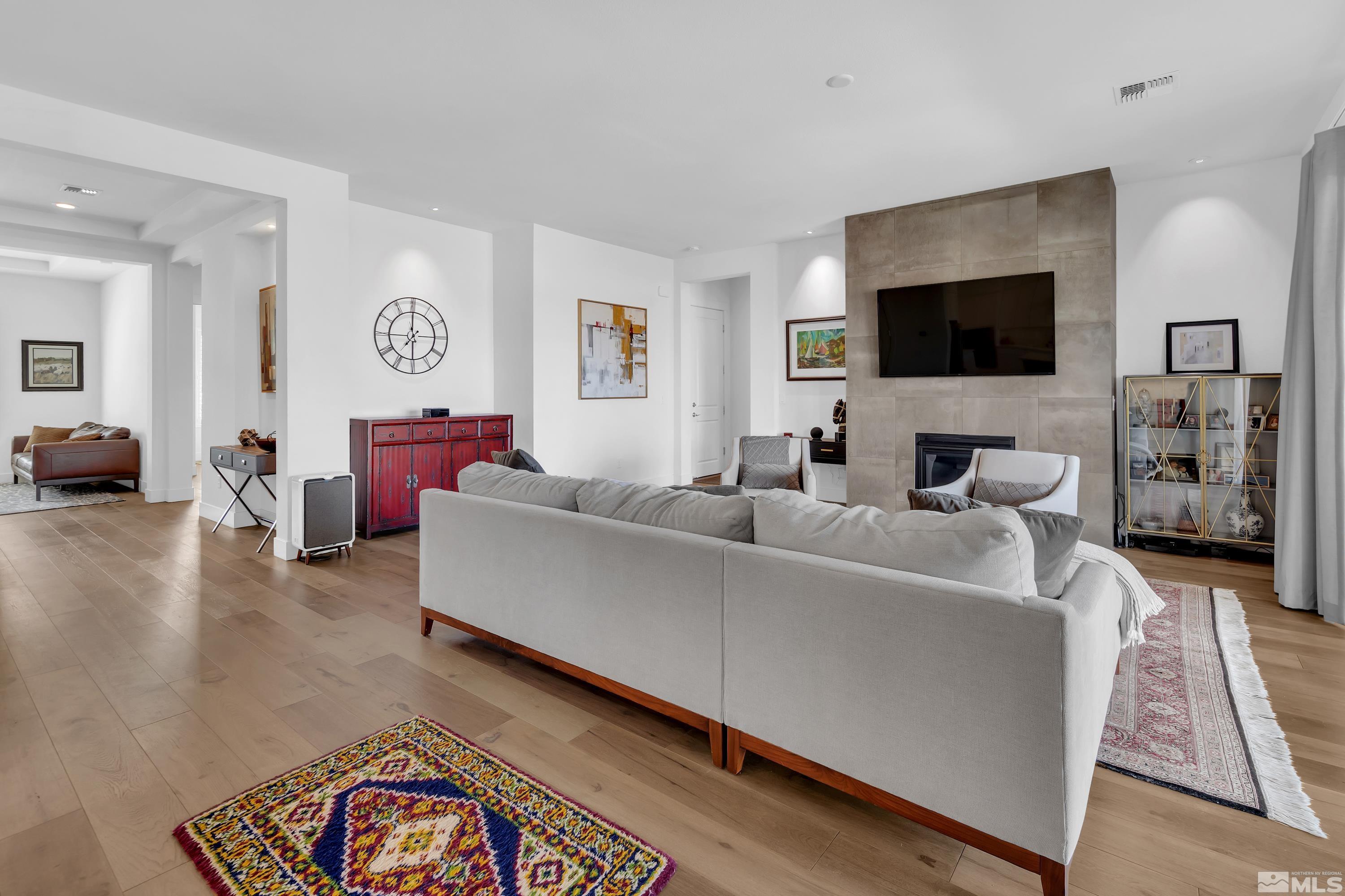2201 Kate's Bridge Drive Reno, NV 89521 - Photo 8 of 39 a living room with furniture and a flat screen tv