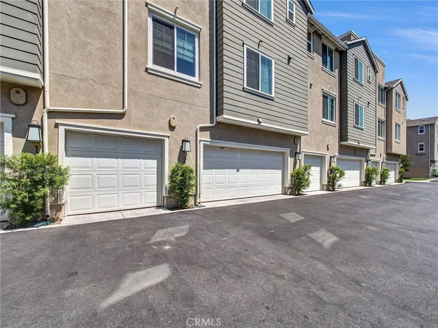 a view of a house with a street