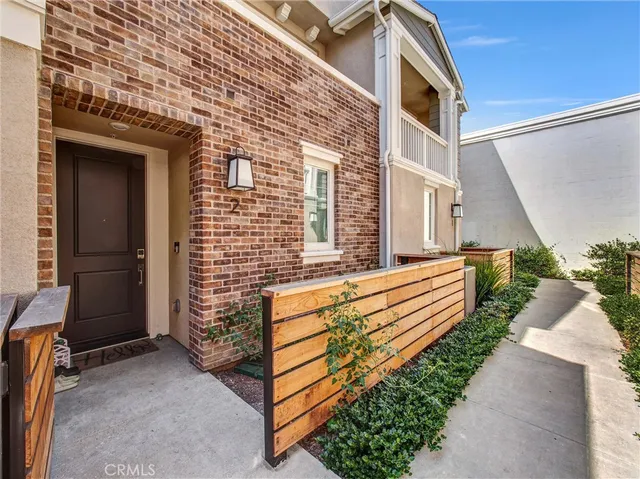 a balcony with view of the house