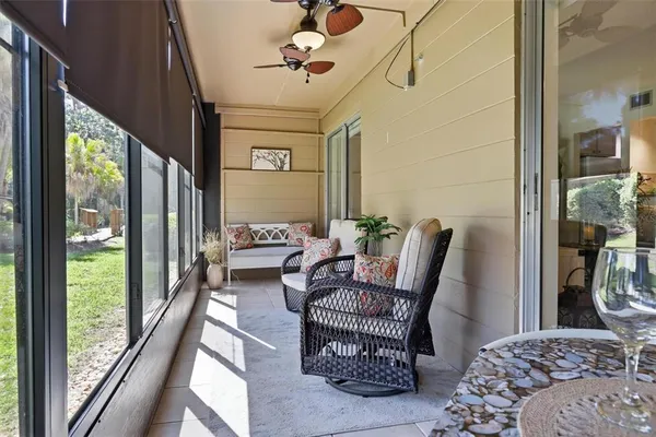 a table and chairs in a balcony