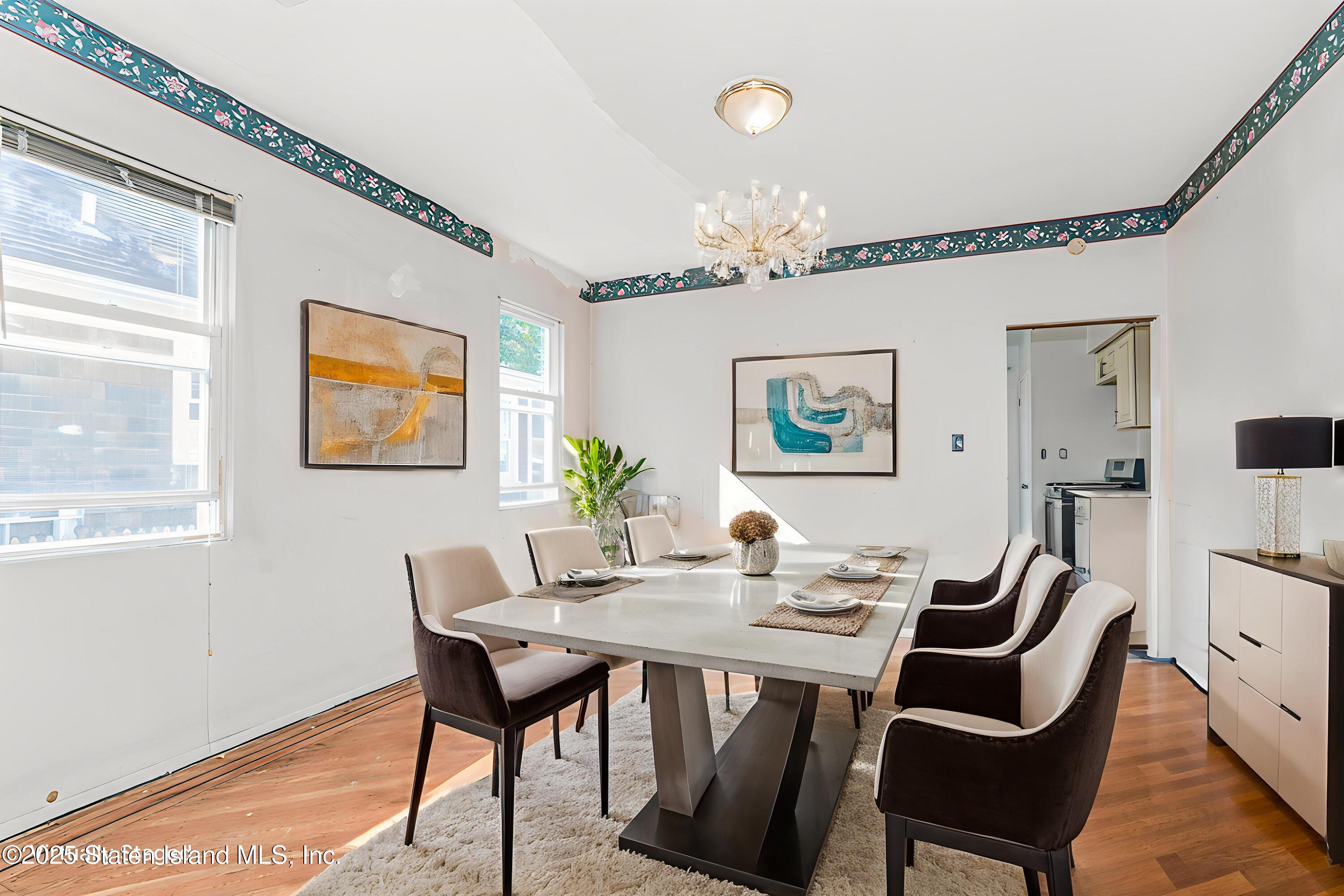 252 Dickie Avenue Staten Island, NY 10314 - Photo 5 of 37 a dining room with furniture and window