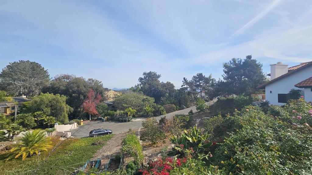 735 Avocado Court, Unit GUEST HOUS Del Mar, CA 92014 - Photo 11 of 12 a view of a lake with a city