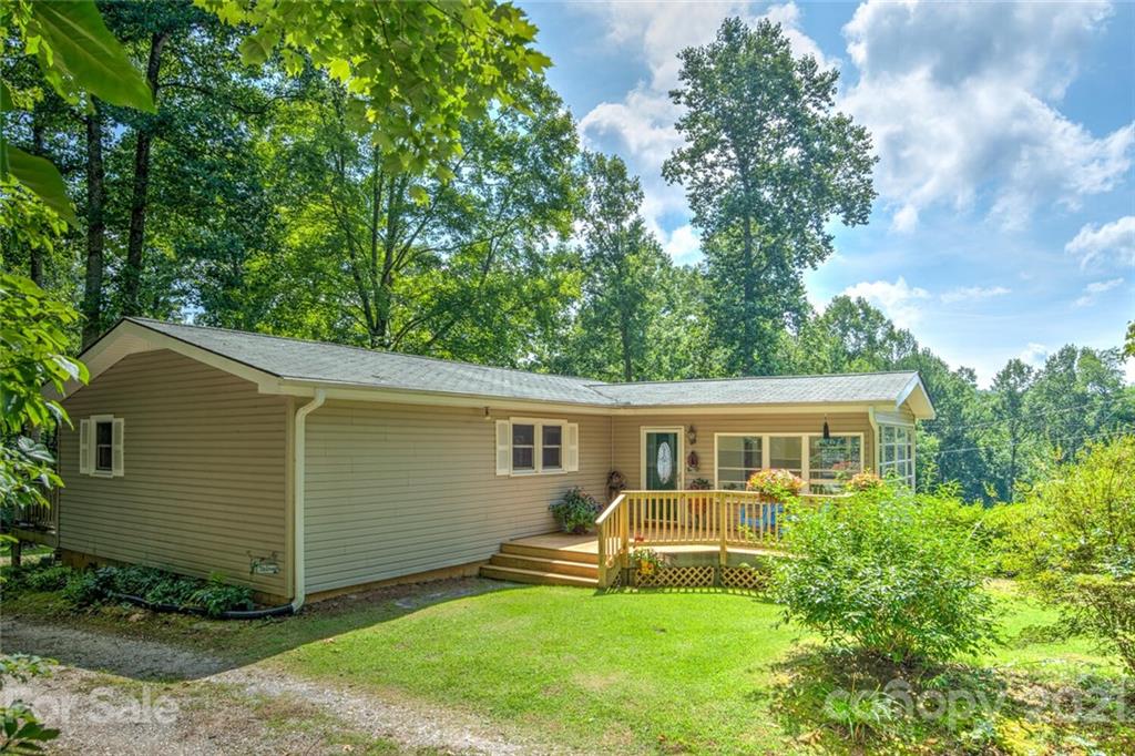 1158 Trammel Gap Road Saluda, NC 28773 - Photo 2 of 32 a front view of house with yard and green space