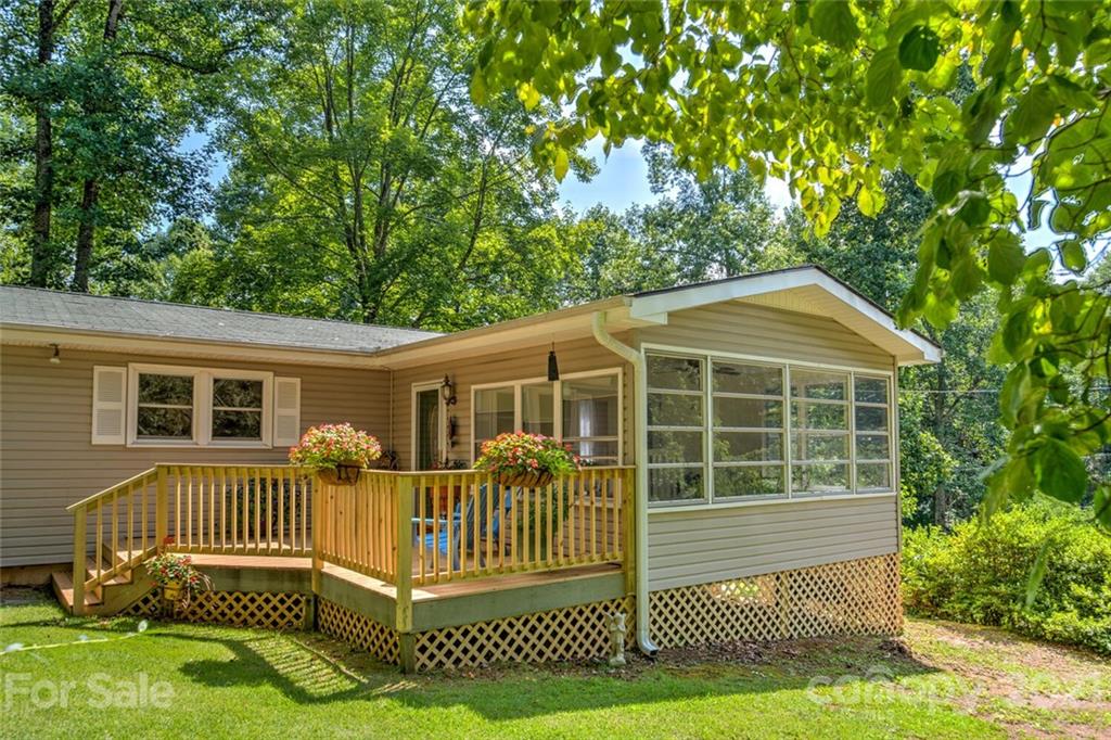 1158 Trammel Gap Road Saluda, NC 28773 - Photo 5 of 32 a view of a house with a yard